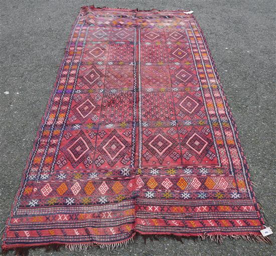 A Jadjim carpet 292 x 141cm